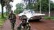 A United Nations (U.N.) peacekeepers' armoured vehicle drives past M23 rebels patrolling a street in Goma in the eastern Democratic Republic of Congo (DRC) REUTERS/James Akena (DEMOCRATIC REPUBLIC CONGO - Tags: CIVIL UNREST POLITICS MILITARY TPX IMAGES OF THE DAY) A United Nations (U.N.) peacekeepers' armoured vehicle drives past M23 rebels patrolling a street in Goma in the eastern Democratic Republic of Congo (DRC) REUTERS/James Akena (DEMOCRATIC REPUBLIC CONGO - Tags: CIVIL UNREST POLITICS MILITARY TPX IMAGES OF THE DAY)