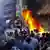 Demonstranten setzten ein Büro der Muslimbrüder in Brand Foto:Amira Mortada, El Shorouk Newspaper/AP/dapd