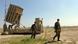 Zwei Sodaten laufen an dem israelischen Raketenabwehr- ystem "Iron Dome" entlang. (Foto: Picture Alliance/ Landov) Zwei Sodaten laufen an dem israelischen Raketenabwehr- ystem "Iron Dome" entlang. (Foto: Picture Alliance/ Landov)
