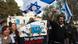 Israeli ultranationalist right-wing protesters hold a placard depicting Prime Minister Benjamin Netanyahu (L) and Foreign Minister Avigdor Lieberman during a demonstration against the Palestinian Authority's efforts to secure a diplomatic upgrade at the United Nations, outside the U.N. offices in the West Bank village of Jabel Mukaber, near Jerusalem November 29, 2012. (Photo via Reuters) Israeli ultranationalist right-wing protesters hold a placard depicting Prime Minister Benjamin Netanyahu (L) and Foreign Minister Avigdor Lieberman during a demonstration against the Palestinian Authority's efforts to secure a diplomatic upgrade at the United Nations, outside the U.N. offices in the West Bank village of Jabel Mukaber, near Jerusalem November 29, 2012. (Photo via Reuters)