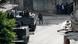 Lebanese army soldiers mounted on armored vehicles stage as Lebanese pro-Syrian rebels Sunni gunmen, center and right, stand in positions during clashes that erupted between pro and anti-Syrian regime gunmen in the northern port city of Tripoli, Lebanon, Thursday Dec. 6, 2012. Gunmen loyal to opposite sides in neighboring Syria's civil war battled in the streets of northern Lebanon and the death toll from three days of fighting. The fighting comes at a time of deep uncertainty in Syria, with rebels closing in on President Bashar Assad's seat of power in Damascus. (Foto:AP/dapd) Lebanese army soldiers mounted on armored vehicles stage as Lebanese pro-Syrian rebels Sunni gunmen, center and right, stand in positions during clashes that erupted between pro and anti-Syrian regime gunmen in the northern port city of Tripoli, Lebanon, Thursday Dec. 6, 2012. Gunmen loyal to opposite sides in neighboring Syria's civil war battled in the streets of northern Lebanon and the death toll from three days of fighting. The fighting comes at a time of deep uncertainty in Syria, with rebels closing in on President Bashar Assad's seat of power in Damascus. (Foto:AP/dapd)