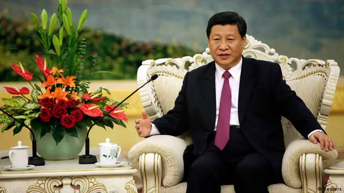 China's Vice President Xi Jinping speaks with Egypt's President Mohamed Mursi (not pictured) during a meeting at the Great Hall of the People, in Beijing, in this August 29, 2012 file photo. In his first three weeks as China's Communist Party boss, Xi Jinping has shown himself to be more confident, direct and relaxed than his predecessor - but also quick to invoke nationalistic themes to win public support and legitimacy. To match story CHINA-XI/ REUTERS/How Hwee Young/Pool/Files (CHINA - Tags: POLITICS)