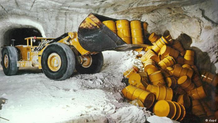 In this archive photo, barrels of radioactive waste are emptied into a salt mine called Asse.