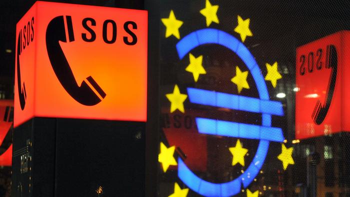 Rettungsroutine - Wort des Jahres; Ein umgekehrtes Eurozeichen neben einem SOS-Symbol