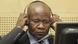 Former Congolese warlord Mathieu Ngudjolo Chui, 39, puts on his headset in the courtroom of the International Criminal Court in The Hague on November 24, 2009. Germain Katanga, 31, and Ngudjolo are accused over an attack by their forces on the village of Bogoro in the Democratic Republic of Congo's northeastern Ituri region that killed 200 people in February 2003. The men face 10 counts of war crimes and crimes against humanity, including using child soldiers to murder, maim and pillage. AFP PHOTO / MICHAEL KOOREN - netherlands out - belgium out - (Photo credit should read MICHAEL KOOREN/AFP/Getty Images) Former Congolese warlord Mathieu Ngudjolo Chui, 39, puts on his headset in the courtroom of the International Criminal Court in The Hague on November 24, 2009. Germain Katanga, 31, and Ngudjolo are accused over an attack by their forces on the village of Bogoro in the Democratic Republic of Congo's northeastern Ituri region that killed 200 people in February 2003. The men face 10 counts of war crimes and crimes against humanity, including using child soldiers to murder, maim and pillage. AFP PHOTO / MICHAEL KOOREN - netherlands out - belgium out - (Photo credit should read MICHAEL KOOREN/AFP/Getty Images)