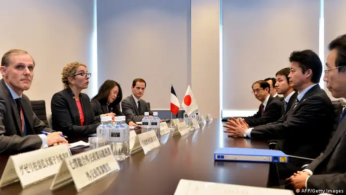 French Ecology, Sustainable Development and Energy Minister Delphine Batho (2nd L) talks to Japanese Foreign Minister Koichiro Gemba (2nd R) during their meeting in Koriyama, Fukushima prefecture in northern Japan on December 15, 2012. High-level officials, including government ministers, from more than 50 countries and organisations began a three-day international conference, 60 kms west of the stricken Fukushima Dai-ichi nuclear plant. AFP PHOTO / Yoshikazu TSUNO (Photo credit should read YOSHIKAZU TSUNO/AFP/Getty Images)