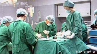 Surgeons perform multiple organs transplant on patient, Shanghai, China, video still