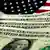 Dollarscheine liegen auf einer US-Flagge - Symbolbild den Haushaltsstreit (Foto: dpa)
