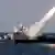 Iranian navy fires a Mehrab missile during the 'Velayat-90' naval wargames in the Strait of Hormuz in southern Iran on January 1, 2012. Iran defiantly announced that it had tested a new missile and made an advance in its nuclear programme after the United States unleashed extra sanctions that sent its currency to a record low. AFP PHOTO/JAMEJAMONLINE/EBRAHIM NOROOZI (Photo credit should read EBRAHIM NOROOZI/AFP/Getty Images)