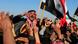 Protesters chant slogans against Iraq's Shiite-led government as they wave national flags during a demonstration in Fallujah, 40 miles (65 kilometers) west of Baghdad, Iraq, Friday, Dec. 28, 2012. Thousands of Iraqi Sunnis massed along a major western highway and in other parts of the country Friday for what appear to be the largest protests yet in a week of demonstrations, intensifying pressure on the Shiite-led government. (Foto:Karim Kadim/AP/dapd) Protesters chant slogans against Iraq's Shiite-led government as they wave national flags during a demonstration in Fallujah, 40 miles (65 kilometers) west of Baghdad, Iraq, Friday, Dec. 28, 2012. Thousands of Iraqi Sunnis massed along a major western highway and in other parts of the country Friday for what appear to be the largest protests yet in a week of demonstrations, intensifying pressure on the Shiite-led government. (Foto:Karim Kadim/AP/dapd)