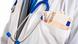 A portrait of a doctor with money in his pocket Fotolia/Minerva Studio A portrait of a doctor with money in his pocket Fotolia/Minerva Studio