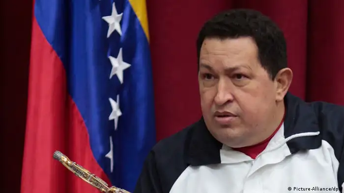 Venezuela's President Hugo Chavez, holding Simon Bolivar's sword during the inauguration of the new defense minister Alfredo Diego Molero Bellavia, before leaving to Havana where he underwent further surgery against his cancer, Miraflores Palace, Caracas, Venezuela, December 10, 2012. From beginning to end, the year 2012 was dominated by the health of Venezuela's President Hugo Chavez, who won another reelection despite cancer, December 17, 2012. Photo: Miraflores/Handout/dpa/au ++ FOR EDITORIAL USE ONLY - NO SALES++