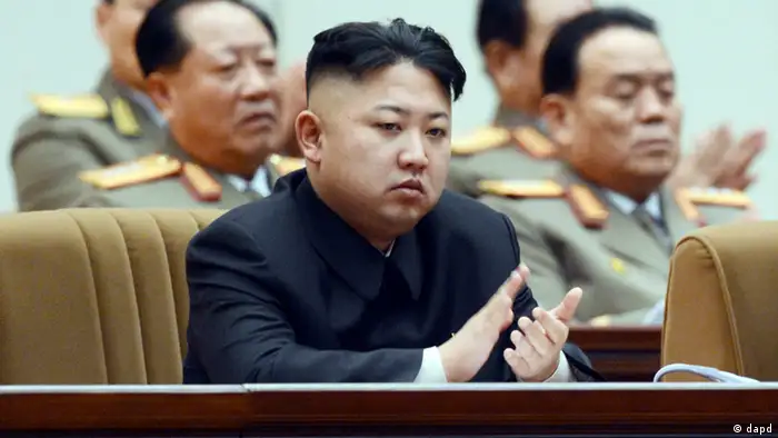 North Korean leader Kim Jong Un claps his hands as he attends a national memorial service on the eve of the anniversary of Kim Jong Il's death in Pyongyang, North Korea, Sunday, Dec. 16, 2012. (AP Photo/Kyodo News) JAPAN OUT, MANDATORY CREDIT, NO LICENSING IN CHINA, HONG KONG, JAPAN, SOUTH KOREA AND FRANCE