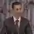 Der syrische Präsident Baschar al-Assad während seiner vom staatlichen Fernsehen übertragenen Rede (Foto: Reuters)