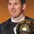 epa03527354 FC Barcelona's Argentinian striker Lionel Messi holds the trophy after being awarded the FIFA Men's World Player of the Year during the FIFA Ballon d'Or Gala 2012 held at the Kongresshaus in Zurich, Switzerland, 07 January 2013. EPA/STEFFEN SCHMIDT