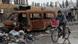 A man rides his bicycle in Aleppo city January 9, 2013. (Photo: Muzaffar Salman/REUTERS) A man rides his bicycle in Aleppo city January 9, 2013. (Photo: Muzaffar Salman/REUTERS)
