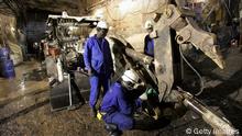 Installations of drills at Cominak underground uranium mine in Arlit in the Air desert, one of the world's most impoverished regions. At the Arlit uranium mine, exploited by Areva of France, the world's largest nuclear engineering group, deep in the Sahara desert in Niger, the uranium ore is so close to the surface that workers go just sixty meters down to the bottom of the open pit mine to retrieve it. The Areva Mining Business Unit specializes in exploration, mining and processing of uranium ore, a strategically important raw material for nuclear fuel. Areva is the world's second largest natural uranium producer. Some 7,000 tons of uranium, about 20% of world production, are extracted each year from mines operated by the group and located mainly in Canada and Niger