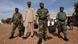 West African army officers arrive at a meeting for plans for the intervention force provided by the ECOWAS grouping of West African states, in Bamako January 15, 2013. France kept up its air strikes against Islamist rebels in Mali as plans to deploy African troops gathered pace on Tuesday amid concerns that delays could endanger a wider mission to dislodge al Qaeda and its allies. REUTERS/Joe Penney (MALI - Tags: CIVIL UNREST POLITICS CONFLICT) West African army officers arrive at a meeting for plans for the intervention force provided by the ECOWAS grouping of West African states, in Bamako January 15, 2013. France kept up its air strikes against Islamist rebels in Mali as plans to deploy African troops gathered pace on Tuesday amid concerns that delays could endanger a wider mission to dislodge al Qaeda and its allies. REUTERS/Joe Penney (MALI - Tags: CIVIL UNREST POLITICS CONFLICT)
