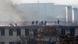 Afghan security forces run on the roof of the Kabul traffic police headquarters as it is attacked by insurgents in Kabul January 21, 2013. A coordinated attack involving at least three suicide bombers and a powerful car bomb took aim at the headquarters of the Kabul traffic department on Monday, followed by a clash between at least one insurgent and security forces, police said. REUTERS/Omar Sobhani (AFGHANISTAN - Tags: CIVIL UNREST CRIME LAW TPX IMAGES OF THE DAY) Afghan security forces run on the roof of the Kabul traffic police headquarters as it is attacked by insurgents in Kabul January 21, 2013. A coordinated attack involving at least three suicide bombers and a powerful car bomb took aim at the headquarters of the Kabul traffic department on Monday, followed by a clash between at least one insurgent and security forces, police said. REUTERS/Omar Sobhani (AFGHANISTAN - Tags: CIVIL UNREST CRIME LAW TPX IMAGES OF THE DAY)