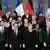 German Chancellor Angela Merkel and French President Francois Hollande (first row 3rd L) pose with French and German ministers and officials at the Chancellery in Berlin January 22, 2013, during a day of celebrations marking the 50th Anniversary of the Elysee Treaty. Merkel hosts Hollande and his government on Tuesday for a celebration marking half a century of post-war partnership, even as their countries struggle to forge a common vision for crisis-hit Europe. REUTERS/Thomas Peter (GERMANY - Tags: POLITICS ANNIVERSARY)