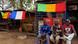 Men sit outside a shop as Malian and French flags decorate the area in Sevare, about 600 km (400 miles) northeast of the capital Bamako January 25, 2013. Government forces advanced into northern Mali on Friday and reached the town of Hombori, some 160 km (100 miles) south of the Islamist rebel stronghold of Gao, after French air strikes drove back the militants, military sources said. REUTERS/Adama Diarra (MALI - Tags: POLITICS CONFLICT SOCIETY) Men sit outside a shop as Malian and French flags decorate the area in Sevare, about 600 km (400 miles) northeast of the capital Bamako January 25, 2013. Government forces advanced into northern Mali on Friday and reached the town of Hombori, some 160 km (100 miles) south of the Islamist rebel stronghold of Gao, after French air strikes drove back the militants, military sources said. REUTERS/Adama Diarra (MALI - Tags: POLITICS CONFLICT SOCIETY)
