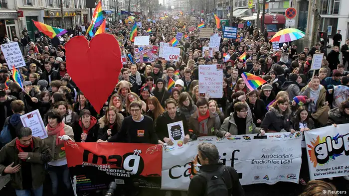 Demonstrators march through the streets of Paris in support of the French government's draft law to legalise marriage and adoption for same-sex couples, January 27, 2013. REUTERS/Christian Hartmann (FRANCE - Tags: POLITICS RELIGION)