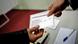 epa03557809 Voter takes a ballot with text 'To develop a nuclear energy in Bulgaria by building a new nuclear power plant?' before voting at a polling station during the national referendum on the future of Bulgaria's nuclear energy, Sofia, Bulgaria 27 January 2013. Bulgarians began casting ballots Sunday in the first democratic referendum in the Balkan country. The vote is about the future of nuclear project with Russia at Belene on the Danube river. But turnout is expected to fall short of the required 60 per cent because many voters are confused by the question: 'Should nuclear energy be developed in Bulgaria through the construction of a new nuclear power plant?'. The center-right government of Prime Minister Boyko Borisov stopped the construction of the Belene nuclear plant due to its high costs for the poorest EU member state. The opposition Socialists, on the contrary, are in favour of a new nuclear plant, the country's second after the Soviet style Kozloduy nuclear power plant. EPA/VASSIL DONEV +++(c) dpa - Bildfunk+++ epa03557809 Voter takes a ballot with text 'To develop a nuclear energy in Bulgaria by building a new nuclear power plant?' before voting at a polling station during the national referendum on the future of Bulgaria's nuclear energy, Sofia, Bulgaria 27 January 2013. Bulgarians began casting ballots Sunday in the first democratic referendum in the Balkan country. The vote is about the future of nuclear project with Russia at Belene on the Danube river. But turnout is expected to fall short of the required 60 per cent because many voters are confused by the question: 'Should nuclear energy be developed in Bulgaria through the construction of a new nuclear power plant?'. The center-right government of Prime Minister Boyko Borisov stopped the construction of the Belene nuclear plant due to its high costs for the poorest EU member state. The opposition Socialists, on the contrary, are in favour of a new nuclear plant, the country's second after the Soviet style Kozloduy nuclear power plant. EPA/VASSIL DONEV +++(c) dpa - Bildfunk+++