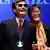 Chinese dissident Chen Guangcheng, his wife Yuan Weijing and their children appear onstage after Chen received The Tom Lantos Human Rights Prize in the Capitol in Washington January 29, 2013. REUTERS/Kevin Lamarque (UNITED STATES - Tags: POLITICS TPX IMAGES OF THE DAY)