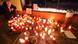 A person looks at candles on the sidewalk in memorial for Arzu Ö obn 16.01.2012 in Detmold-Remmighausen Photo: Oliver Krato dpa/lnw +++(c) dpa - Bildfunk+++ A person looks at candles on the sidewalk in memorial for Arzu Ö obn 16.01.2012 in Detmold-Remmighausen Photo: Oliver Krato dpa/lnw +++(c) dpa - Bildfunk+++