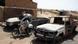 A man rides a bike past two burnt-out wrecks of vehicles allegedly used by Islamists following a major air strike, on February 3, 2013 in Diabaly. France said it carried out major air strikes on February 3, 2013 near Kidal, the last bastion of armed extremists chased from Mali's desert north in a lightning French-led offensive, after a whirlwind visit by President Francois Hollande. An army spokesman said 30 warplanes had bombed training and logistics centres run by Islamist extremists overnight in the Tessalit area north of Kidal, where French troops took the airport Wednesday and have been working to secure the town itself. AFP PHOTO / PASCAL GUYOT (Photo credit should read PASCAL GUYOT/AFP/Getty Images) A man rides a bike past two burnt-out wrecks of vehicles allegedly used by Islamists following a major air strike, on February 3, 2013 in Diabaly. France said it carried out major air strikes on February 3, 2013 near Kidal, the last bastion of armed extremists chased from Mali's desert north in a lightning French-led offensive, after a whirlwind visit by President Francois Hollande. An army spokesman said 30 warplanes had bombed training and logistics centres run by Islamist extremists overnight in the Tessalit area north of Kidal, where French troops took the airport Wednesday and have been working to secure the town itself. AFP PHOTO / PASCAL GUYOT (Photo credit should read PASCAL GUYOT/AFP/Getty Images)