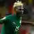 Burkina Faso's Aristide Bance celebrates after scoring their first goal against Ghana during their African Cup of Nations semifinal match at the Mbombela stadium in Nelspruit, South Africa, Wednesday, Feb. 6 2013. (AP Photo/Armando Franca)