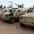 Chadian soldiers form a line with their armoured vehicles in the northeastern town of Kidal, Mali, February 7, 2013. Around 1,000 troops from Chad led by the president's son advanced towards the mountains of northeast Mali on Thursday to join French search-and-destroy operations hunting Islamist jihadists. Picture taken February 7, 2013. REUTERS/Cheick Diouara (MALI - Tags: POLITICS CIVIL UNREST CONFLICT)