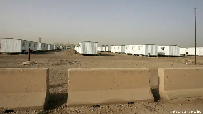 [29663082] Iraqis open a new camp for Iranian opposition groups epa03110181 A general view, shows the former U.S military base which will be the new temporary camp for the Iranian opposition group Mujahideen-e-Khalq (MEK) refugees, near Baghdad's international Airport, Iraq, 17 February 2012. The first group of Iranian exile group will leave Camp Ashraf in Diyala province, northeast of Baghdad to a former US military base outside Baghdad. Camp Liberty which will be the new temporary camp ahead to resettle the group outside of Iraq under a plan agreed with the United Nations. EPA/ALI ABBAS