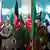 سربازان کشورهای مختلف در جریان یک مراسم نظامی در افغانستان 