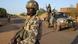 Malian soldiers patrol on February 10, 2013 in northern city of Gao. Fights between Islamist rebels and Malian soldiers broke out in the center of Gao, recently taken over by the French military to Malian armed Islamist groups, hit by two suicides bombings within two days. AFP PHOTO / PASCAL GUYOT (Photo credit should read PASCAL GUYOT/AFP/Getty Images) Malian soldiers patrol on February 10, 2013 in northern city of Gao. Fights between Islamist rebels and Malian soldiers broke out in the center of Gao, recently taken over by the French military to Malian armed Islamist groups, hit by two suicides bombings within two days. AFP PHOTO / PASCAL GUYOT (Photo credit should read PASCAL GUYOT/AFP/Getty Images)
