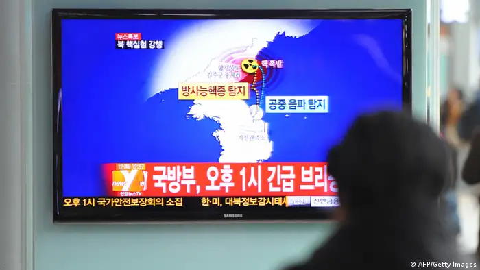 GettyImages 161501149 South Korean passengers watch TV news reporting North Korea's apparent nuclear test, at the Seoul train station on February 12, 2013. North Korea's apparent nuclear test had an explosive yield of between six and seven kilotons, South Korea's defence ministry said, revising its earlier estimate of 10 kilotons or more. Ministry spokesman Kim Min-Seok said seismic monitors had detected a tremor with a 4.9 magnitude emanating from the North's nuclear test site. AFP PHOTO / KIM JAE-HWAN (Photo credit should read KIM JAE-HWAN/AFP/Getty Images)