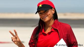 Isabel dos Santos, daughter of former Angolan President Jose Eduardo dos Santos, gives the V for victory sign