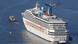 The Carnival Triumph cruise ship is towed towards the port of Mobile, Alabama, February 14, 2013. The 893-foot (272 meter) vessel, notorious for reports of raw sewage from overflowing toilets, has been without propulsion and running on emergency generator power since Sunday, when an engine room fire left it adrift in the Gulf of Mexico. REUTERS/ Lyle Ratliff (UNITED STATES - Tags: SOCIETY HEALTH TRAVEL MARITIME TRANSPORT BUSINESS) The Carnival Triumph cruise ship is towed towards the port of Mobile, Alabama, February 14, 2013. The 893-foot (272 meter) vessel, notorious for reports of raw sewage from overflowing toilets, has been without propulsion and running on emergency generator power since Sunday, when an engine room fire left it adrift in the Gulf of Mexico. REUTERS/ Lyle Ratliff (UNITED STATES - Tags: SOCIETY HEALTH TRAVEL MARITIME TRANSPORT BUSINESS)