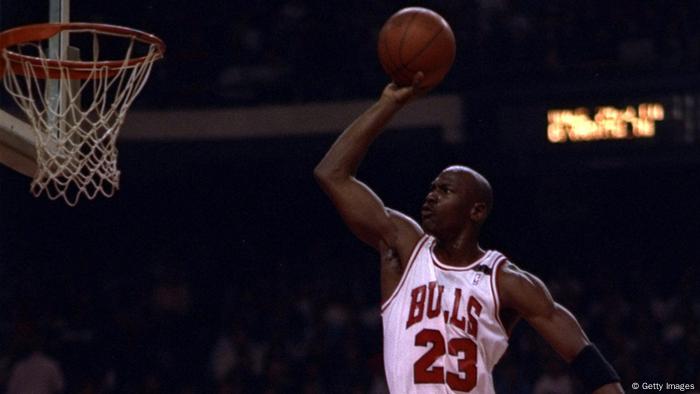 Michael Jordan in the Chicago Bulls jersey dunking