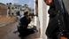 A rebel fighter shoots towards Syrian government forces through a window at a flat in the Salaheddine neighbourhood of Aleppo on February 16, 2013. More than 300 people were abducted by armed groups in northwestern Syria over two days in an unprecedented string of sectarian kidnappings, a watchdog and residents said. AFP PHOTO/BULENT KILIC (Photo credit should read BULENT KILIC/AFP/Getty Images) A rebel fighter shoots towards Syrian government forces through a window at a flat in the Salaheddine neighbourhood of Aleppo on February 16, 2013. More than 300 people were abducted by armed groups in northwestern Syria over two days in an unprecedented string of sectarian kidnappings, a watchdog and residents said. AFP PHOTO/BULENT KILIC (Photo credit should read BULENT KILIC/AFP/Getty Images)