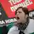 A Bulgarian woman shout slogans during a protest AP Photo/Valentina Petrova