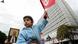 A Tunisian young girl waves a national flag during a demonstration on February 23, 2013 on the Habib Bourguiba Avenue in Tunis. Hundreds of demonstrators marched to protest against the Islamist party Ennahda in power, and demanded that opposition leader Chokri Belaid's killers be found. At background, Belaid is featured on the placard. AFP PHOTO / FETHI BELAID (Photo credit should read FETHI BELAID/AFP/Getty Images) A Tunisian young girl waves a national flag during a demonstration on February 23, 2013 on the Habib Bourguiba Avenue in Tunis. Hundreds of demonstrators marched to protest against the Islamist party Ennahda in power, and demanded that opposition leader Chokri Belaid's killers be found. At background, Belaid is featured on the placard. AFP PHOTO / FETHI BELAID (Photo credit should read FETHI BELAID/AFP/Getty Images)