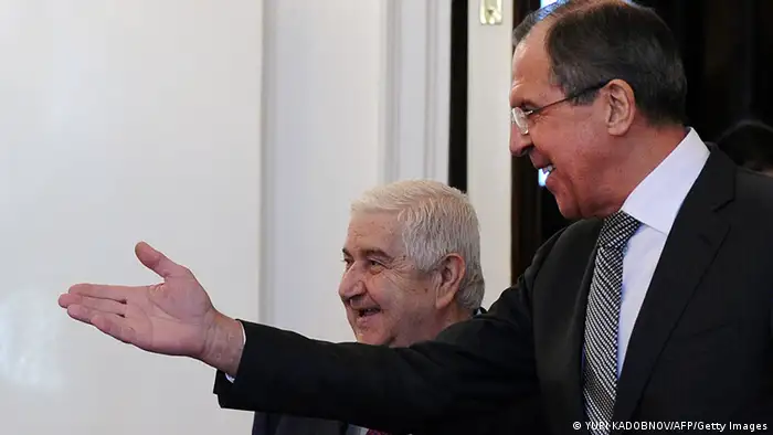 Russian Foreign Minister Sergei Lavrov (R) speaks with his Syrian counterpart Walid al-Muallem during their meeting in Moscow on February 25, 2013. The regime of Syrian President Bashar al-Assad is ready to talk with all parties, including armed groups, who want dialogue to end the conflict, Walid al-Muallem said today at the start of talks with Lavrov. AFP PHOTO / YURI KADOBNOV (Photo credit should read YURI KADOBNOV/AFP/Getty Images)