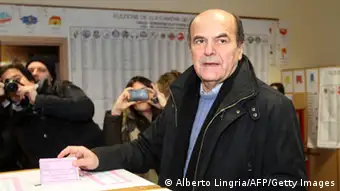 Democratic Party's Pier Luigi Bersani, the favourite to become Italy's prime minister after the general election, casts his ballot in a polling station on February 24, 2013 in Piacenza. Italians fed up with austerity went to the polls on Sunday in elections where the centre-left is the favourite, as Europe held its breath for signs of fresh instability in the eurozone's third economy. AFP PHOTO / ALBERTO LINGRIA (Photo credit should read ALBERTO LINGRIA/AFP/Getty Images)