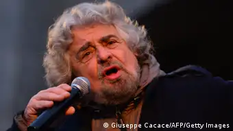 The head of the populist Five Star Movement, comedian Beppe Grillo, whose has been winning votes among those critical of Monti's austerity policy, addresses supporters during an electoral rally on February 12, 2013 in Bergamo, northern Italy. Comedian-turned-politician Beppe Grillo is candidate to the general elections on February 24-25. AFP PHOTO / GIUSEPPE CACACE (Photo credit should read GIUSEPPE CACACE/AFP/Getty Images)