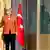 German Chancellor Angela Merkel shakes hands with Turkey's Prime Minister Tayyip Erdogan during a welcoming ceremony in Ankara February 25, 2013. REUTERS/Umit Bektas (TURKEY - Tags: POLITICS)