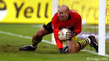 Jan Koller gathers up the ball in front of his goal