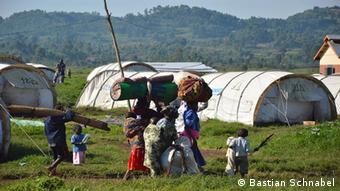 South Sudanese refugees arrive at Uganda camp