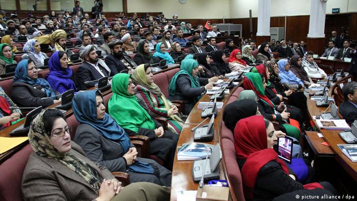 Afghan Parliamentarians listen to a speech by President Hamid Karzai (not in picture) during the opening session of Afghan Parliament in Kabul, Afghanistan, 06 March 2013. (Photo: EPA/S. SABAWOON)