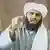 A man identified as Suleiman Abu Ghaith appears in this still image taken from an undated video address. A son-in-law of Osama bin Laden who served as al Qaeda's spokesman has been arrested and detained in Jordan in an operation led by Jordanian authorities and the FBI, U.S. government sources said on Thursday. The sources said Abu Ghaith, a militant who had appeared in videos representing al Qaeda after the Sept. 11, attacks on New York and Washington in 2001, had initially been picked up in Turkey. REUTERS/Handout / Eingestellt von wa